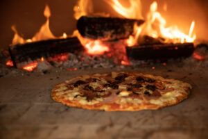 pizza baking in pizza oven