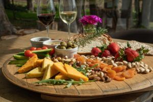 experiences at Elgin Valley depicted by a range of appetizers and wine glasses