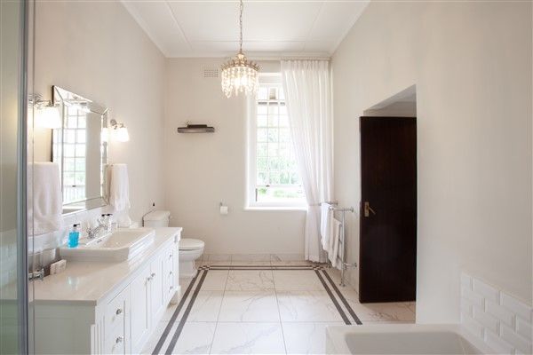 experiences at Elgin Vintners illustrated by Browne Suite en suite bathroom view to window