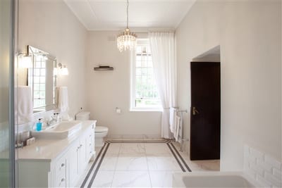 experiences at Elgin Vintners illustrated by Browne Suite en suite bathroom view to window