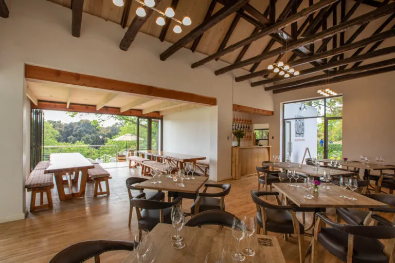 texperiences at Elgin Valley depicted by tasting room tables and chairs