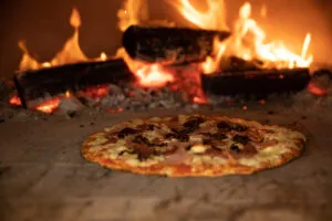 pizza baking in pizza oven