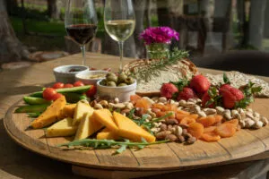 experiences at Elgin Valley depicted by a range of appetizers and wine glasses